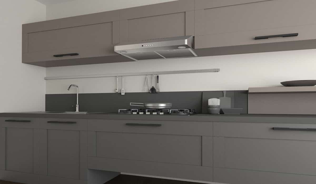 appliance photoshoot with vent hood over a range with cabinents and counters