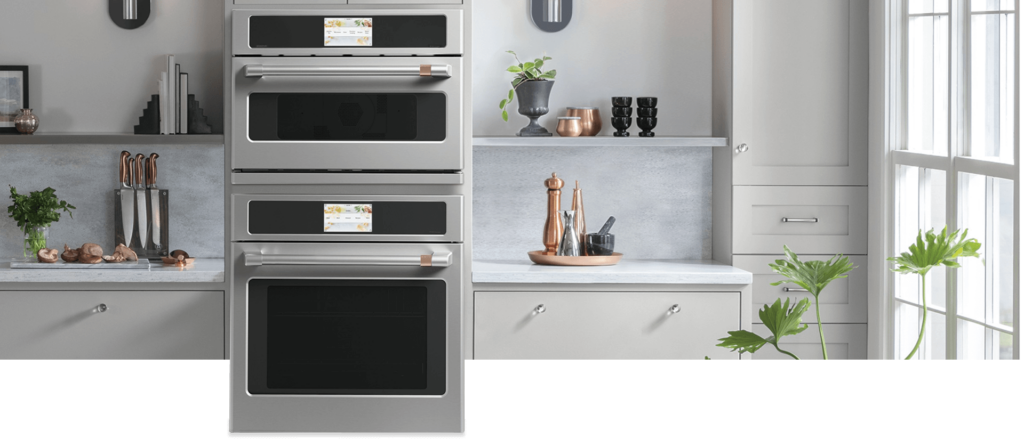 appliances in a kitchen with two layer oven